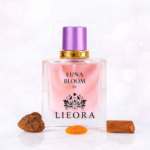 Luna Bloom by LIEORA perfume bottle with soft pink fragrance, purple cap and elegant glass design on a light white-pink glossy background – best perfume for women, long-lasting floral musk scent.