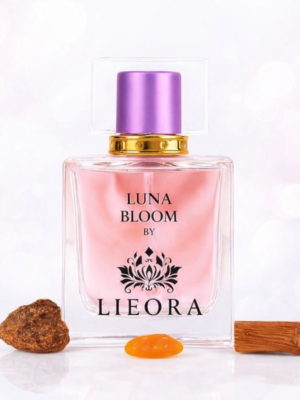 Luna Bloom by LIEORA perfume bottle with soft pink fragrance, purple cap and elegant glass design on a light white-pink glossy background – best perfume for women, long-lasting floral musk scent.